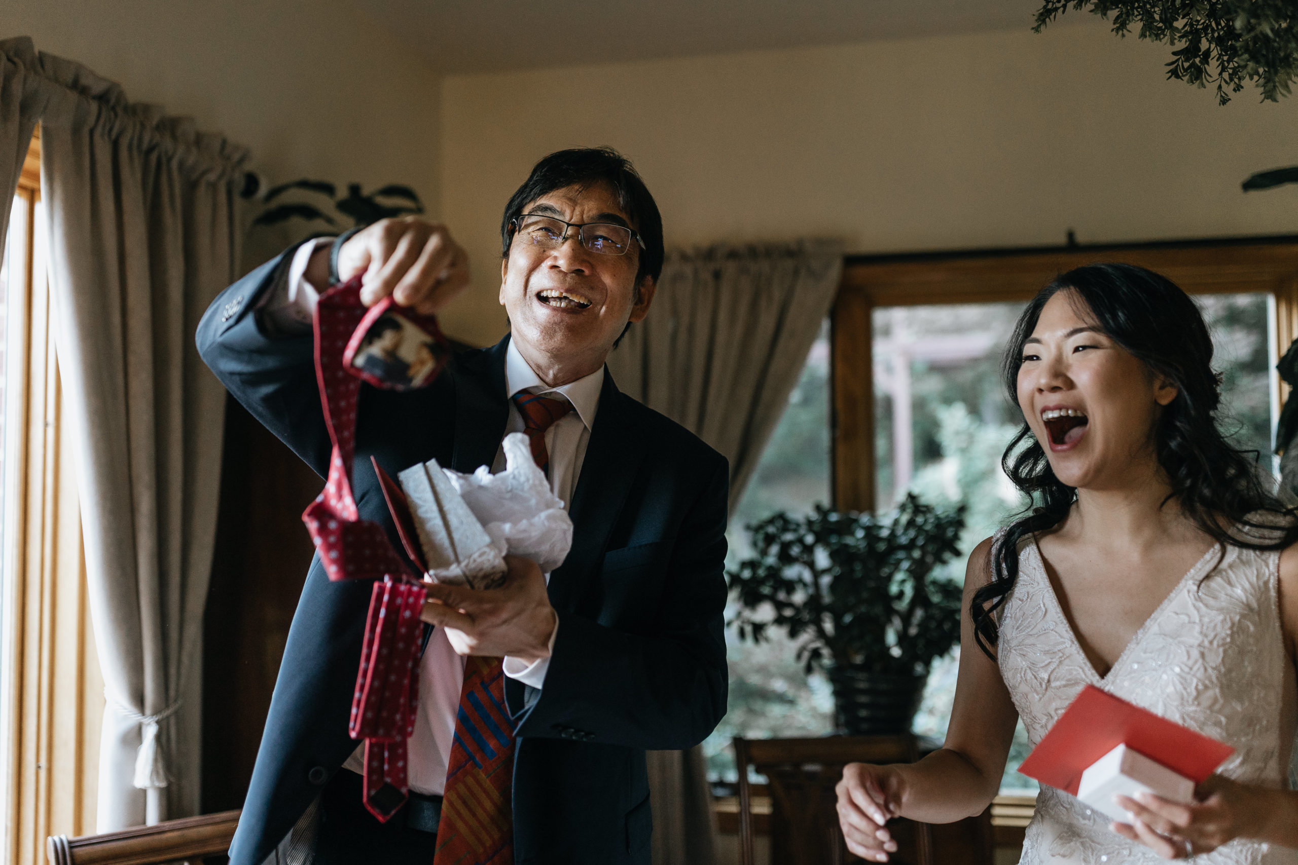 dad opens gift from his daughter on her wedding day and is overjoyed