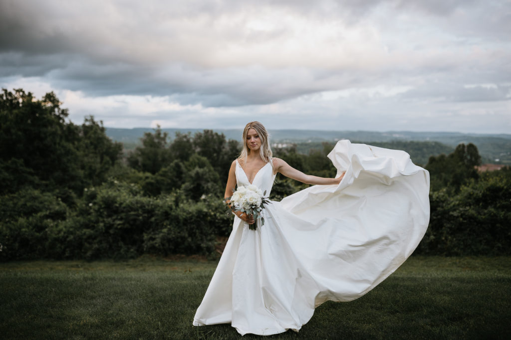 bride portraits in front of a mountain view