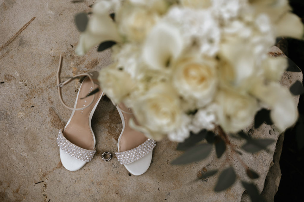 bride shoes sitting on rock at Morgantown Wedding 