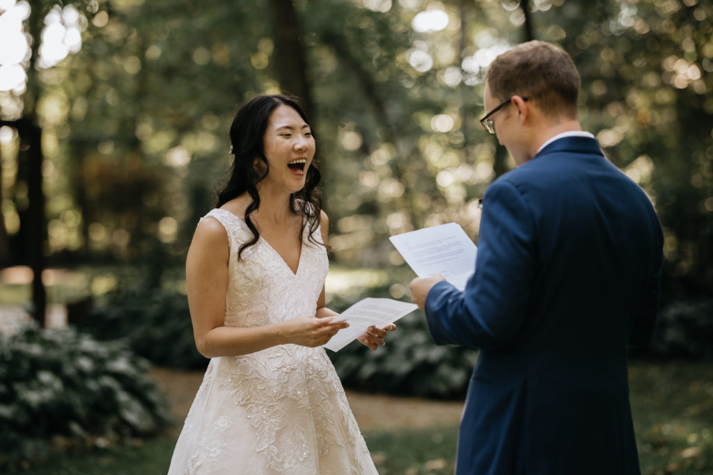 Bride reading note to groom