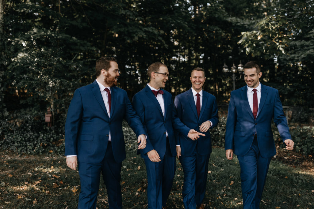 groomsmen walking and laughing