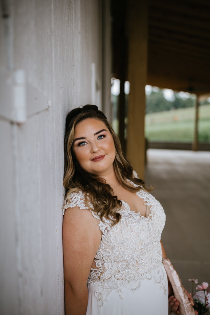 up close photo of bride leaning against wall