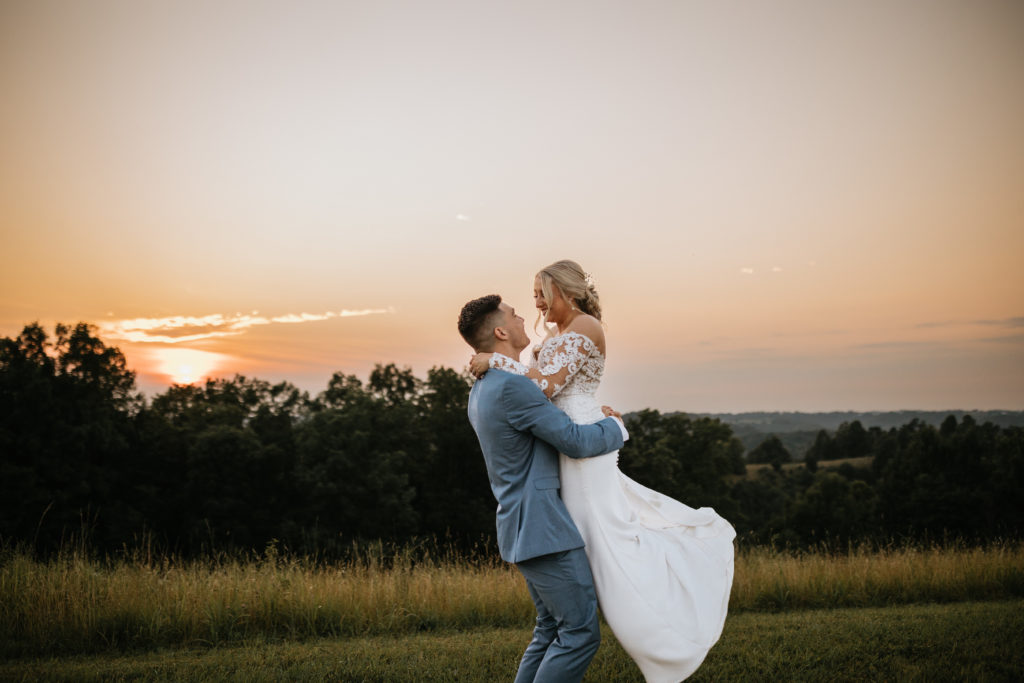 bride and groom during sunset
